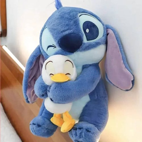 peluche stitch avec son doudou canard 2