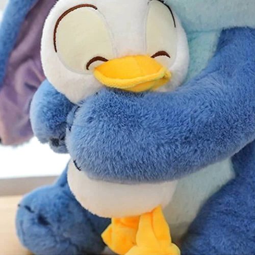 peluche stitch avec son doudou canard 4