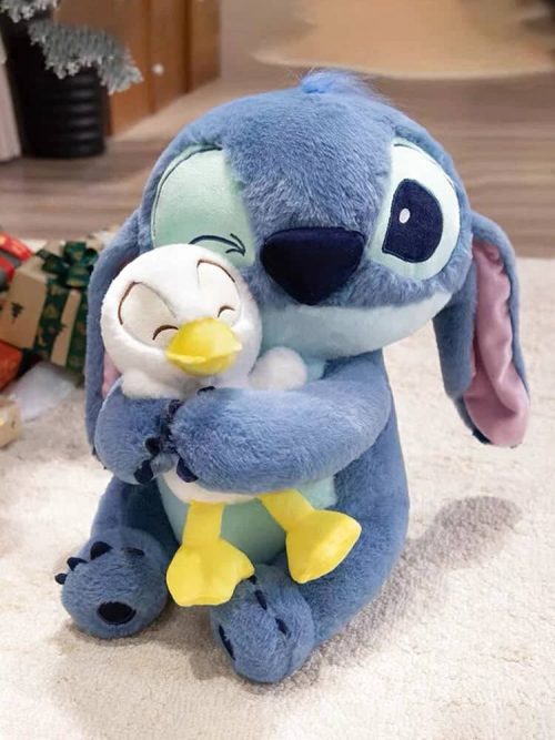 peluche stitch avec son doudou canard 6